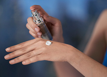 girl applying Diamond Cocoon Sheer Cream on her face